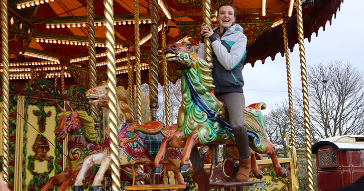 blogger kate Stanforth sat on Merry-go-Round fairground ride at Beamish Museum